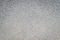 Peel texture. Old rough stone on cement pattern wall background. Vintage grunge plaster or concrete stucco surface Royalty Free Stock Photo