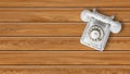 Peel white vintage phone on a wooden background Royalty Free Stock Photo