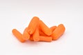 Peeled Baby Carrots on White Background Royalty Free Stock Photo