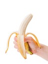 Peeled banana in hand Royalty Free Stock Photo