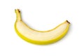 Peeled banana on one side isolated on a white background. Peeled banana Royalty Free Stock Photo