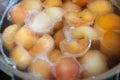 Peeled boiled apples in a sugar syrup