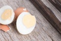 Peeled boiled egg on wood background Royalty Free Stock Photo