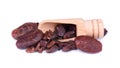 Peeled cacao beans, isolated on white background. Roasted and aromatic cocoa beans, natural chocolate.
