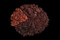 Peeled, chopped cocoa beans and pile chopped, milled chocolate isolated on black background