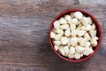 Peeled cloves of garlic on an old wooden background closeup top view Royalty Free Stock Photo