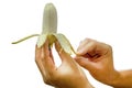 Peeled Cultivated banana in hand Royalty Free Stock Photo