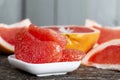 peeled and divided into parts ripe red grapefruit