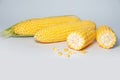 The peeled ear of corn, a piece of and seeds on a white, isolated Royalty Free Stock Photo