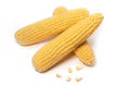 The peeled ear of corn, a piece of and seeds on a white, isolated Royalty Free Stock Photo