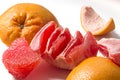 Peeled fresh juicy grapefruit pulp and peel isolated on white background Royalty Free Stock Photo