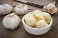 Peeled garlic in bowl Royalty Free Stock Photo