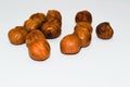Peeled hazelnuts close-up isolate on a white background