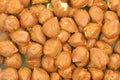 Peeled hazelnuts pattern, top view. Macro image, close-up
