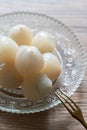 Peeled lychee pulp on a plate Royalty Free Stock Photo