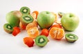 Peeled mandarin, apples and kiwies Royalty Free Stock Photo