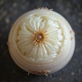 A peeled onion showing its translucent layers