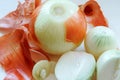 Peeled onions, the onions in their skins Royalty Free Stock Photo
