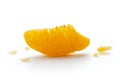 Peeled orange fruit pulp isolated on white background. Macro photo of citrus fruit slice. Royalty Free Stock Photo