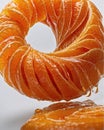 A peeled orange with its glossy segments arranged in a neat circular pattern Royalty Free Stock Photo