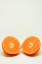 Peeled orange and mandarin slices on white isolated background Royalty Free Stock Photo