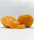 peeled oranges on a white background