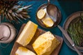 Peeled pineapple, lemon and rosemary for jam