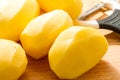 Peeled potatoes in bowl Royalty Free Stock Photo