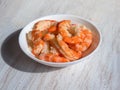 Peeled prawns in a bowl. Cooked fresh giant prawns, close up
