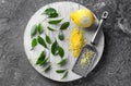 Peeled ripe lemon with zest and grater on wooden board Royalty Free Stock Photo