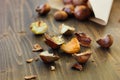 Peeled roasted chestnuts with paper cornet on table Royalty Free Stock Photo