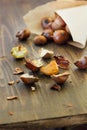 Peeled roasted chestnuts with paper cornet on table Royalty Free Stock Photo