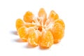 Peeled segments of tangerine or mandarin citrus fruit isolated on white background Royalty Free Stock Photo