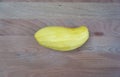 Peeled skin mango on timber block