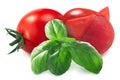 Peeled tomato with fresh  basil leaves isolated Royalty Free Stock Photo