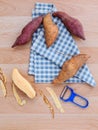 Peeled two varieties of sweet potatoes with peeler on rustic woo Royalty Free Stock Photo