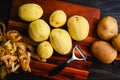 Peeled Yukon Gold Potatoes on a Wooden Cutting Board Royalty Free Stock Photo