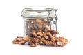 Peeled walnut kernels in jar isolated on white background Royalty Free Stock Photo