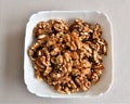 Peeled walnuts in a white plate Royalty Free Stock Photo