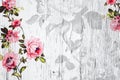 Peeled wooden texture with shabby chic vintage roses