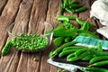 Peeled young peas in a glass bowl