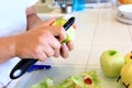 Peeling Apples for cooking Royalty Free Stock Photo