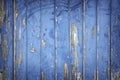Peeling blue paint on wooden door or fence Royalty Free Stock Photo