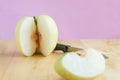 Peeling chinese pear by knife on the wooden board Royalty Free Stock Photo