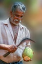 Peeling coconut