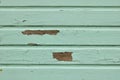 Peeling and cracked paint on wood panelling background with copyspace Royalty Free Stock Photo