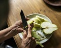 Peeling fresh pear fruit Royalty Free Stock Photo