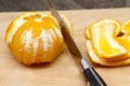 Peeling an orange