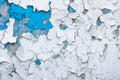 Peeling paint on a concrete wall. Blue and white painted abstract background, grunge cracked surface, pattern texture Royalty Free Stock Photo