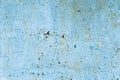 Peeling paint on rusty steel door. Corrosion on a metal surface. Abstract background, texture. Blue cracked painted wall Royalty Free Stock Photo